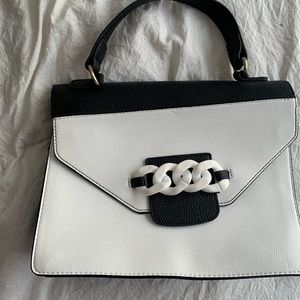 Never worn Nanette Lepore black, white and gold purse